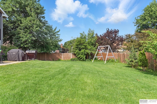 3520 N 151st Cir, Omaha, NE 68116 - fenced backyard featuring a playground
