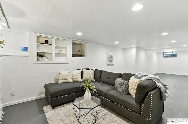 2311 N 51st St, Omaha, NE 68104 - living room featuring finished concrete flooring and recessed lighting