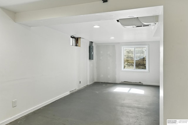 2311 N 51st St, Omaha, NE 68104 - empty room with concrete flooring and electric panel