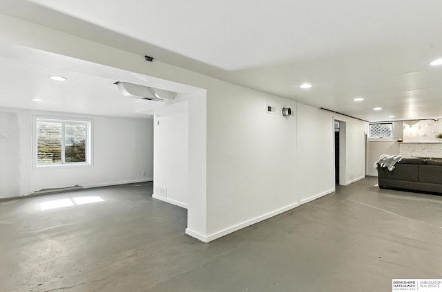 2311 N 51st St, Omaha, NE 68104 - spare room featuring concrete flooring and recessed lighting