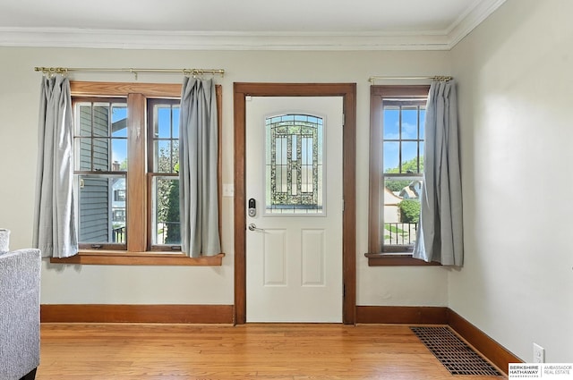 2311 N 51st St, Omaha, NE 68104 - entryway featuring ornamental molding and wood finished floors