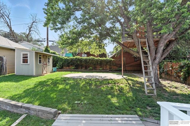 2311 N 51st St, Omaha, NE 68104 - fenced backyard featuring an outdoor structure and a patio