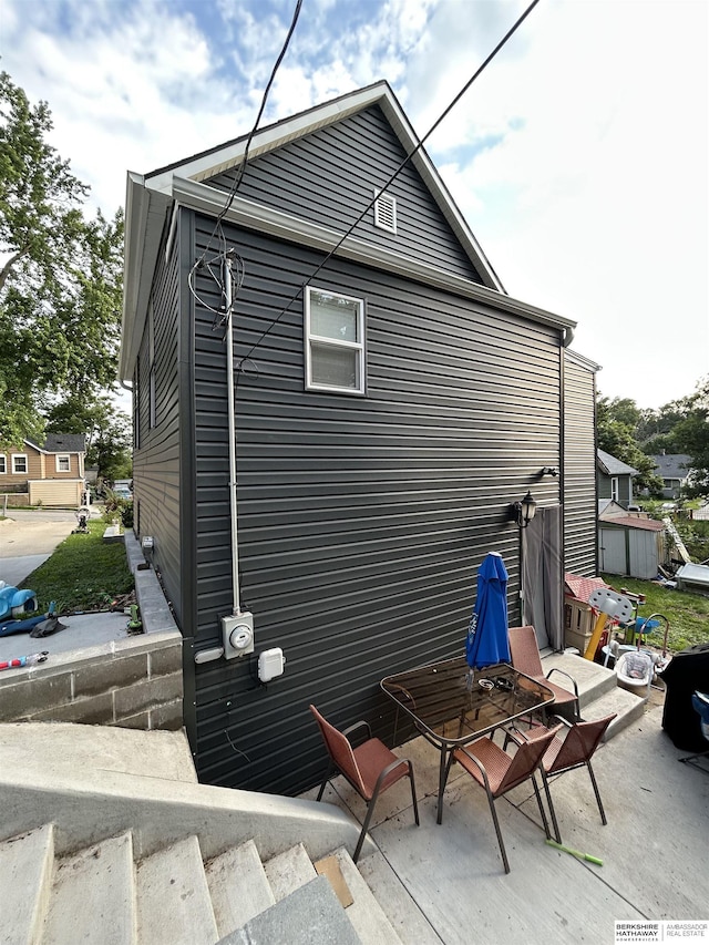1618 Frederick St, Omaha, NE 68108 - view of side of home with a patio