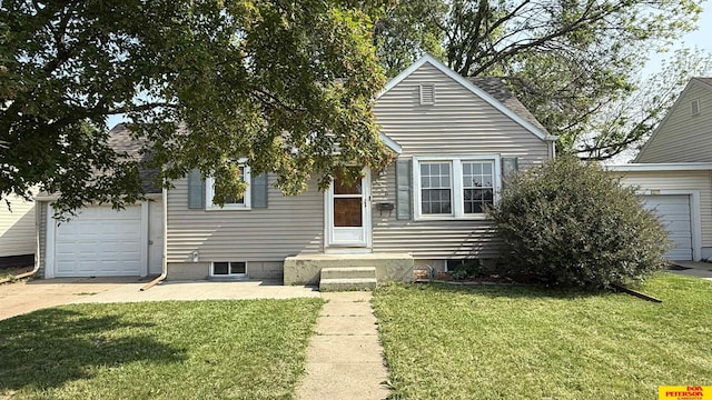 1506 E 1st St, Fremont, NE 68025 - view of front of home featuring a front yard, a garage, and roof with shingles