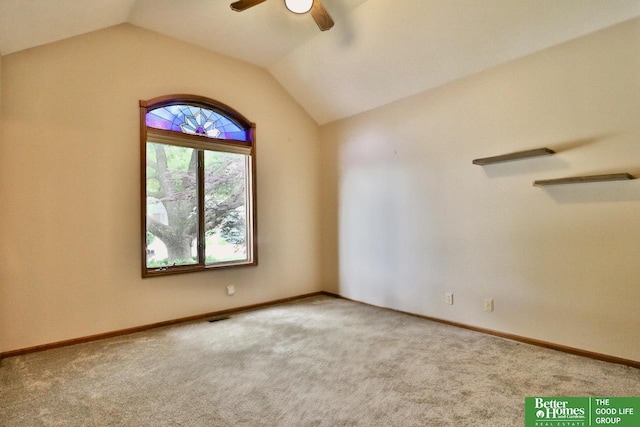 2330 N 133rd Cir, Omaha, NE 68164 - unfurnished room featuring a ceiling fan, carpet, vaulted ceiling, and baseboards