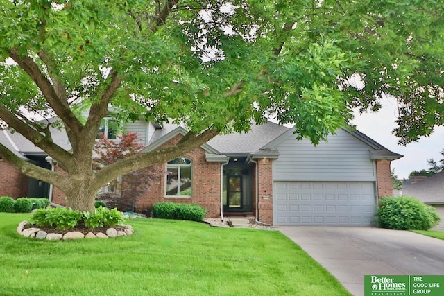 2330 N 133rd Cir, Omaha, NE 68164 - view of front facade with brick siding, concrete driveway, a front lawn, and a garage