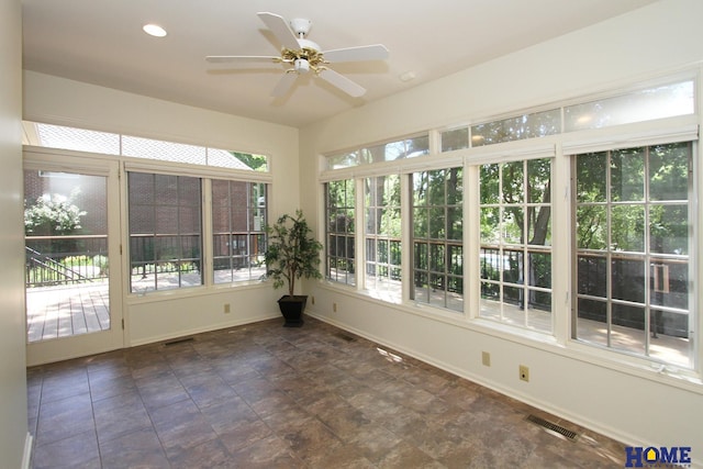 6427 Lone Tree Dr, Lincoln, NE 68512 - unfurnished sunroom with baseboards and recessed lighting