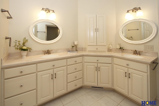 6427 Lone Tree Dr, Lincoln, NE 68512 - bathroom with double vanity and tile patterned floors