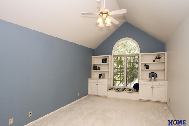 6427 Lone Tree Dr, Lincoln, NE 68512 - unfurnished office featuring ceiling fan, vaulted ceiling, light carpet, and baseboards