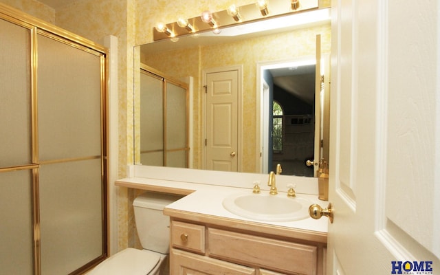 6427 Lone Tree Dr, Lincoln, NE 68512 - full bath with vanity, toilet, and a shower with shower door