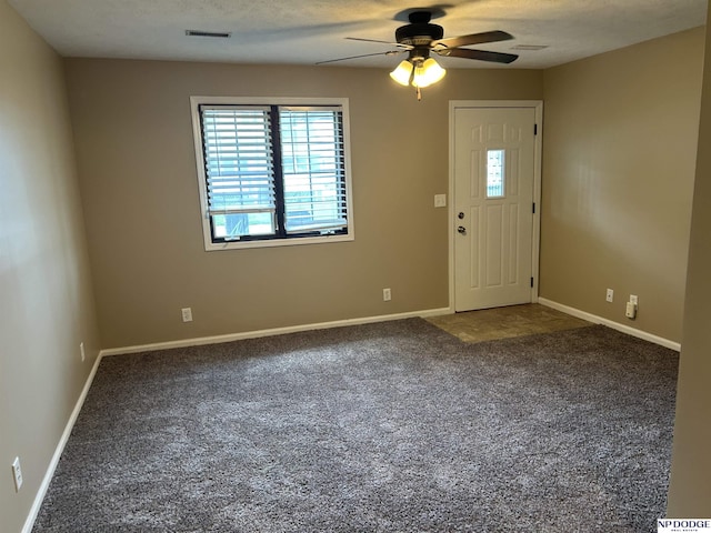 6048 P St, Omaha, NE 68117 - carpeted entrance foyer with ceiling fan and baseboards