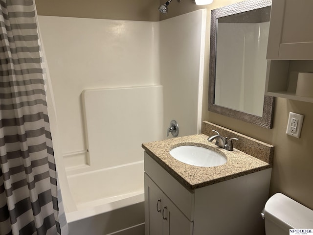 6048 P St, Omaha, NE 68117 - full bath featuring vanity, shower / tub combo, and toilet