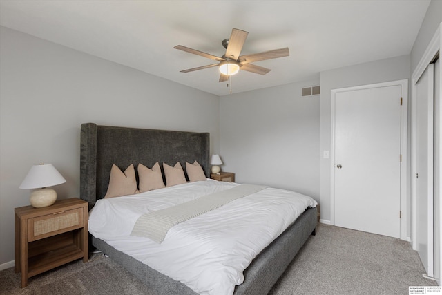 2629 N 129th Cir, Omaha, NE 68164 - bedroom with carpet floors, a closet, a ceiling fan, and baseboards
