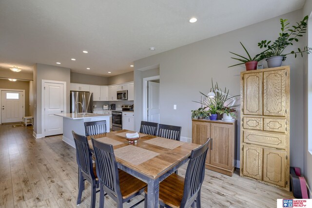 1637 W Avalanche Rd, Lincoln, NE 68521 - dining area featuring light wood finished floors and recessed lighting
