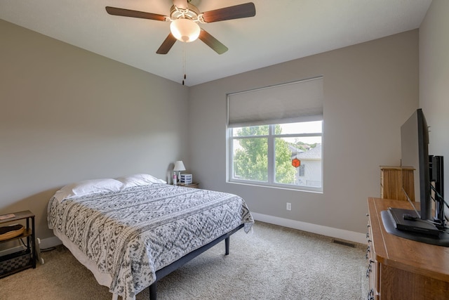 1637 W Avalanche Rd, Lincoln, NE 68521 - bedroom featuring light carpet and a ceiling fan