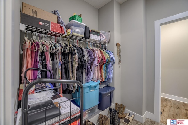 1637 W Avalanche Rd, Lincoln, NE 68521 - walk in closet featuring wood finished floors