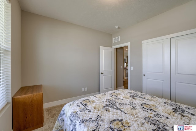 1637 W Avalanche Rd, Lincoln, NE 68521 - carpeted bedroom featuring a closet and baseboards