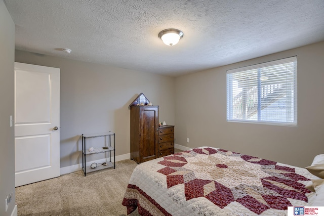 1637 W Avalanche Rd, Lincoln, NE 68521 - bedroom featuring light carpet and a textured ceiling