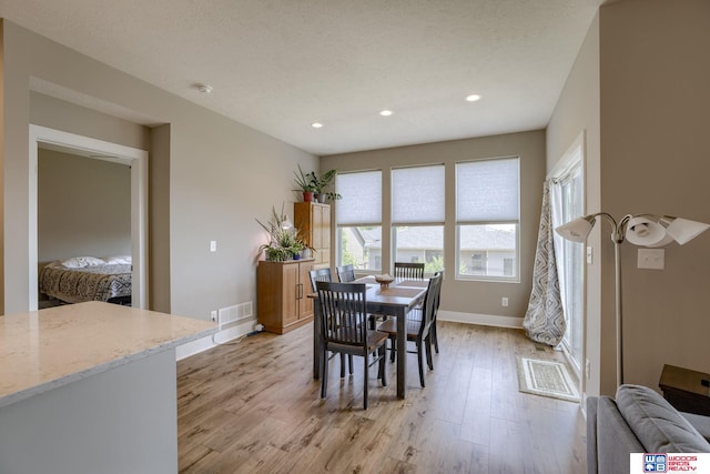 1637 W Avalanche Rd, Lincoln, NE 68521 - dining area with light wood-type flooring and recessed lighting