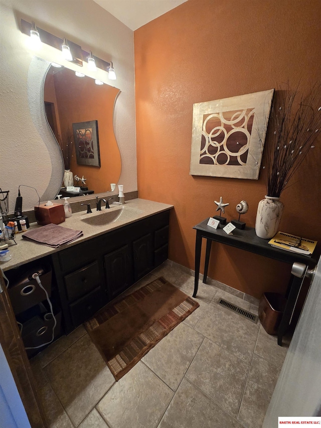 1807 S 16th Circle Dr, Beatrice, NE 68310 - bathroom featuring vanity and tile patterned floors