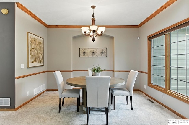 5418 S 165th St, Omaha, NE 68135 - dining space featuring light carpet, crown molding, a chandelier, and plenty of natural light