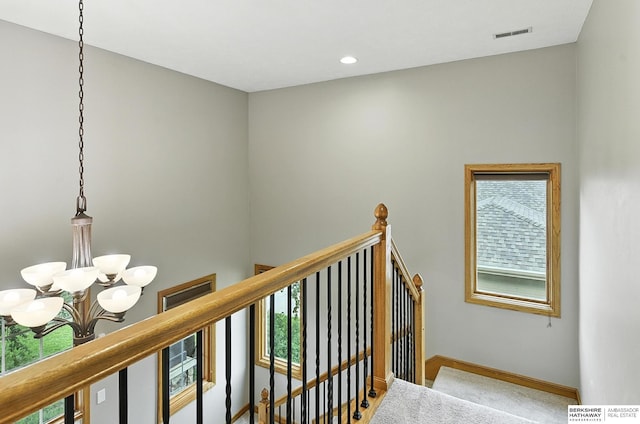 5418 S 165th St, Omaha, NE 68135 - stairs with a chandelier, carpet floors, and recessed lighting