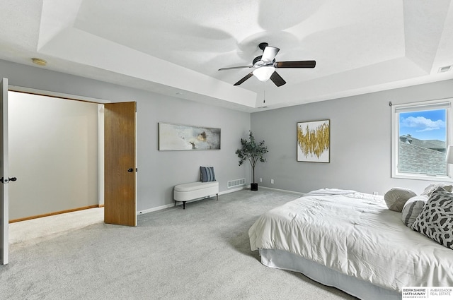 5418 S 165th St, Omaha, NE 68135 - carpeted bedroom featuring a raised ceiling and a ceiling fan