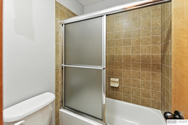 5418 S 165th St, Omaha, NE 68135 - full bath featuring toilet and bath / shower combo with glass door