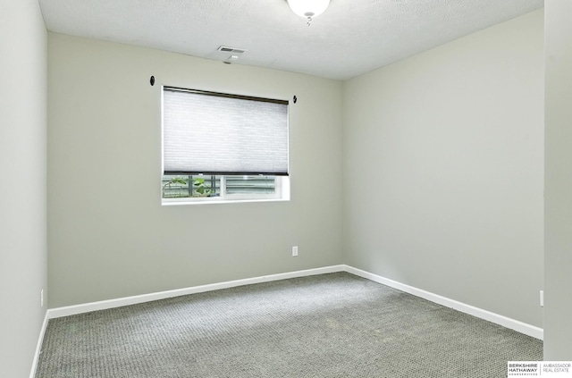 5418 S 165th St, Omaha, NE 68135 - unfurnished room featuring carpet floors and a textured ceiling
