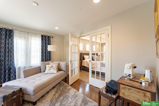 523 N 52nd St, Omaha, NE 68132 - living room featuring french doors, wood finished floors, and recessed lighting