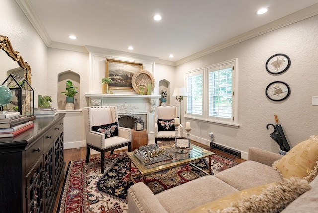 523 N 52nd St, Omaha, NE 68132 - living room with wood finished floors, ornamental molding, a fireplace, a textured wall, and recessed lighting