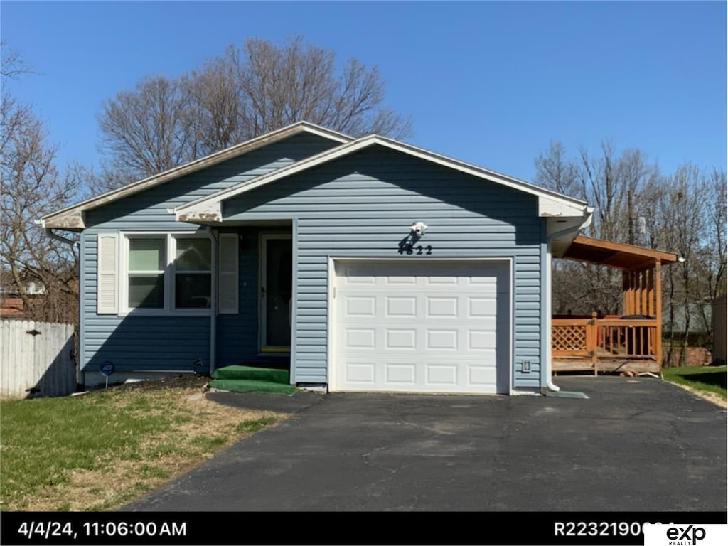4822 Ruggles St, Omaha, NE 68104 - single story home with an attached garage and driveway