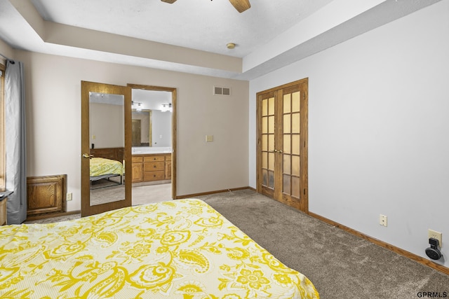 759 Simms Ave, Council Bluffs, IA 51503 - bedroom featuring french doors, light colored carpet, baseboards, ensuite bath, and a ceiling fan