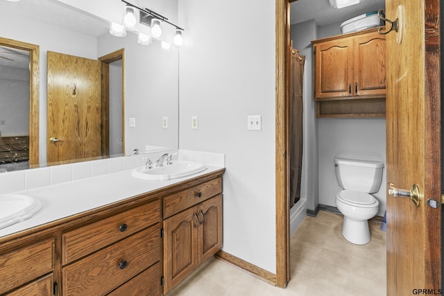 759 Simms Ave, Council Bluffs, IA 51503 - full bath featuring toilet, double vanity, a stall shower, and baseboards