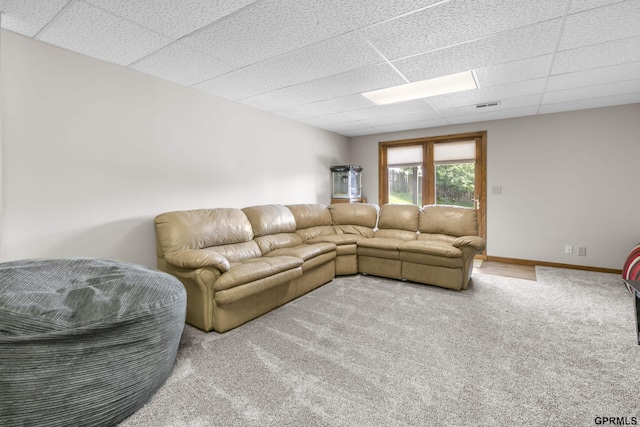 759 Simms Ave, Council Bluffs, IA 51503 - living area with a paneled ceiling, carpet floors, and baseboards