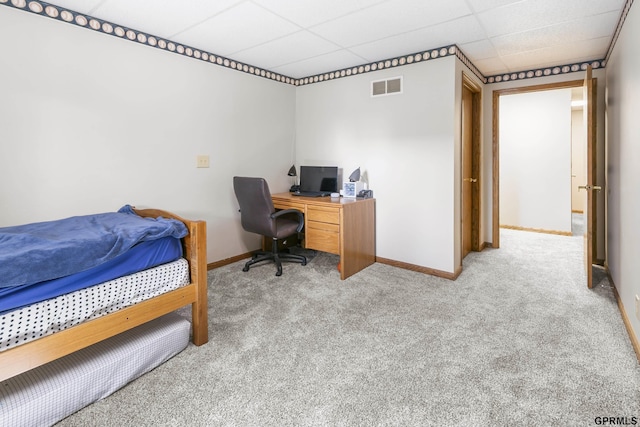 759 Simms Ave, Council Bluffs, IA 51503 - bedroom with light carpet, baseboards, a drop ceiling, and an office area