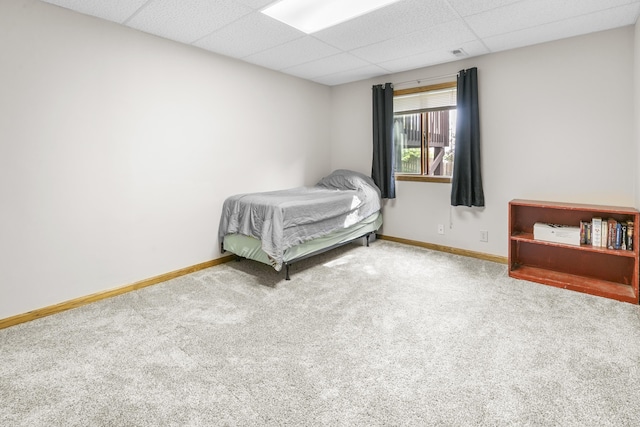 759 Simms Ave, Council Bluffs, IA 51503 - carpeted bedroom with a drop ceiling and baseboards