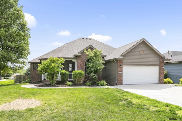 759 Simms Ave, Council Bluffs, IA 51503 - view of front of home featuring an attached garage, concrete driveway, brick siding, and roof with shingles