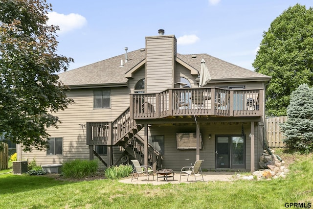 759 Simms Ave, Council Bluffs, IA 51503 - rear view of house featuring a wooden deck, a fire pit, roof with shingles, stairs, and a chimney