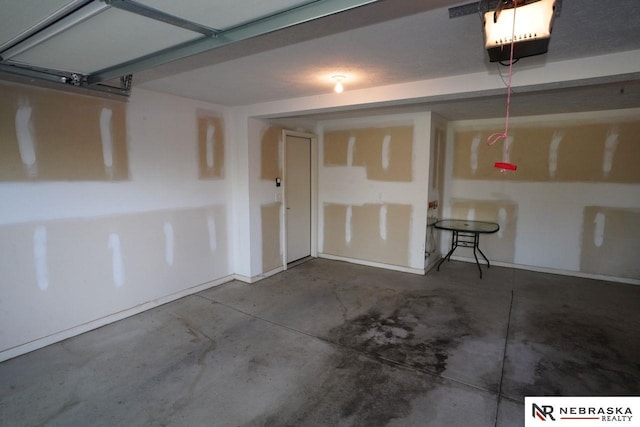 19122 Drexel St, Omaha, NE 68135 - garage with a garage door opener