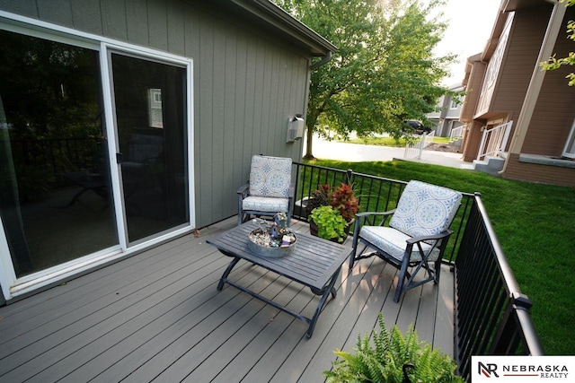 19122 Drexel St, Omaha, NE 68135 - wooden terrace featuring a lawn