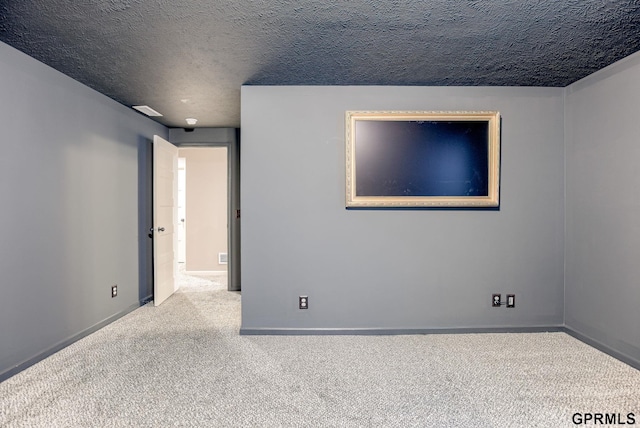 7810 S 184th Ave, Omaha, NE 68136 - spare room featuring carpet flooring, baseboards, and a textured ceiling