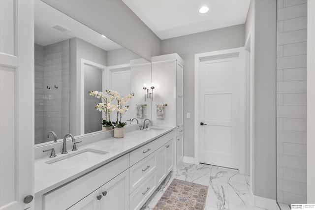 3307 S 209th St, Omaha, NE 68022 - bathroom with marble finish flooring, double vanity, and recessed lighting