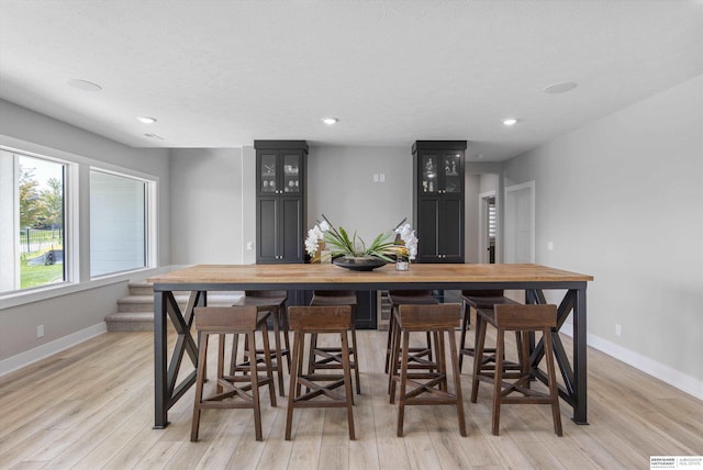 3307 S 209th St, Omaha, NE 68022 - dining room with light wood-type flooring and recessed lighting