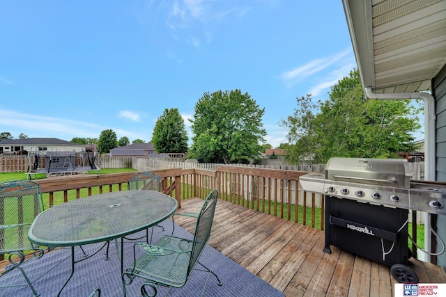 1035 Primrose Ln, Hickman, NE 68372 - wooden terrace with a grill, outdoor dining area, and a residential view