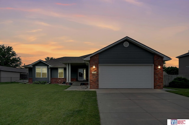 1035 Primrose Ln, Hickman, NE 68372 - single story home featuring brick siding, driveway, and an attached garage