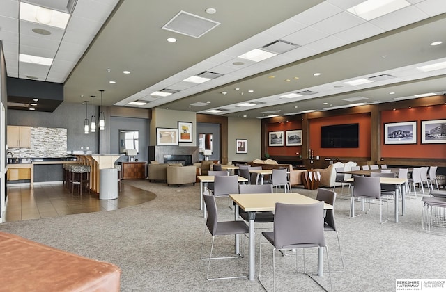 3200 Farnam Ct Unit 3409, Omaha, NE 68131 - tiled dining space featuring carpet floors