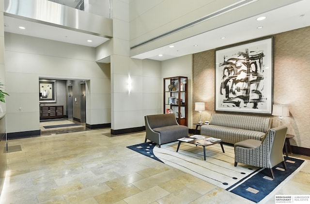 3200 Farnam Ct Unit 3409, Omaha, NE 68131 - lobby featuring a towering ceiling and recessed lighting