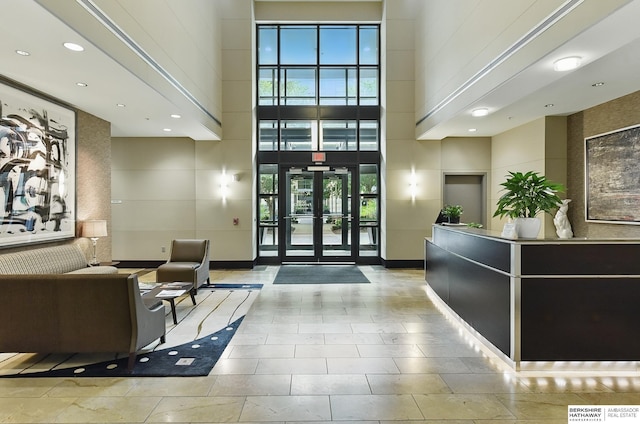 3200 Farnam Ct Unit 3409, Omaha, NE 68131 - reception area featuring a towering ceiling and recessed lighting