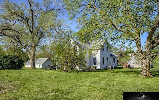 13602 S 36th St, Bellevue, NE 68123 - view of green lawn featuring central AC unit